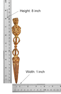 Brass-toned furba phurpa pendant dagger on ruler, height 8 in, width 1 in