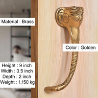 Brass Ganesha face door handle, golden finish, curved grip with ridged shaft