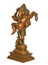 Dancing Ganesha brass murti with side view, ornamental details and small figure
