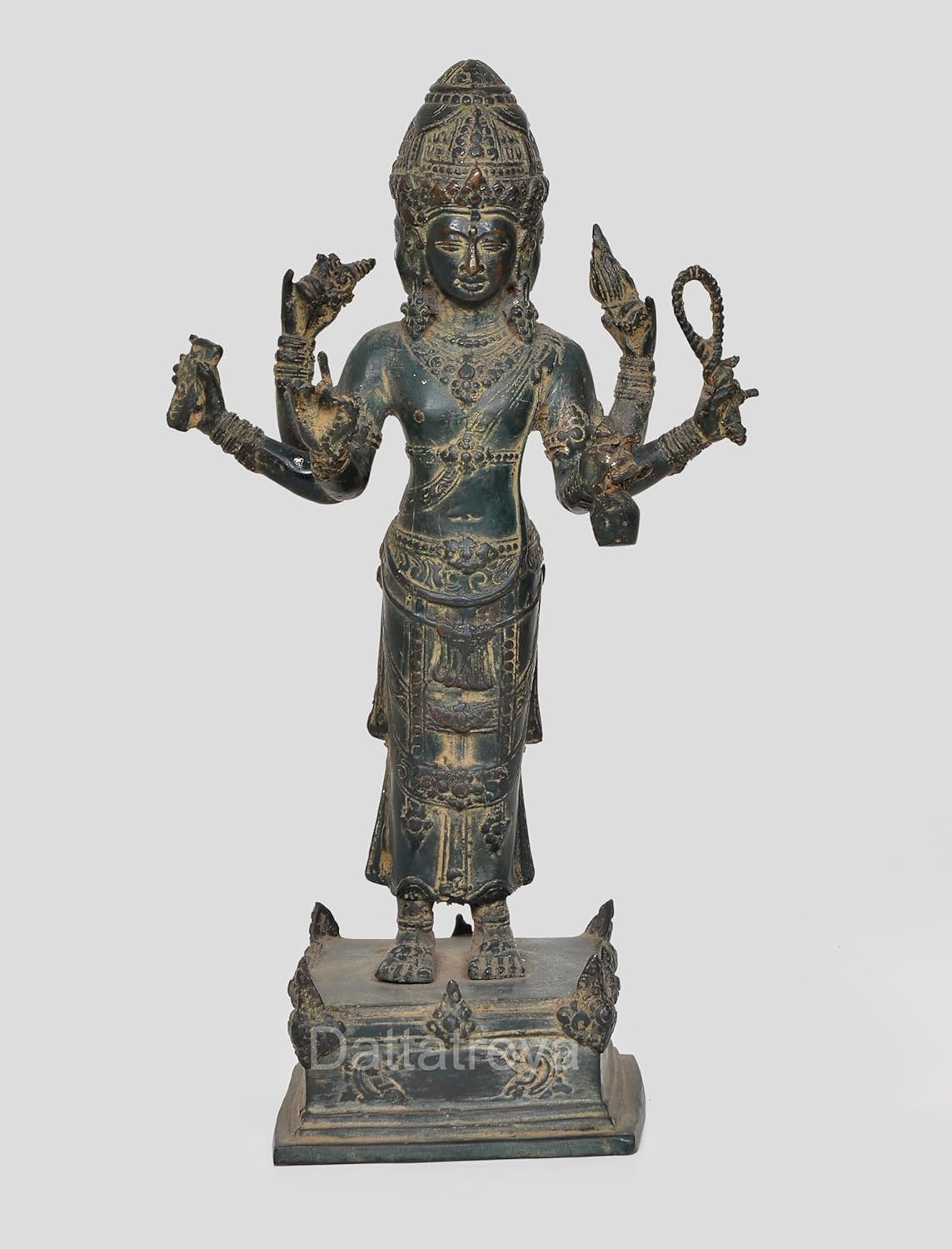 Bronze-finish four-armed Vishnu statue with ornate headdress, standing on pedestal