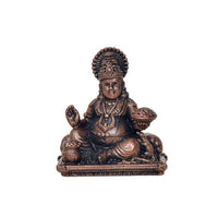 Copper Kuber idol statue, seated with one hand raised and other holding a bowl