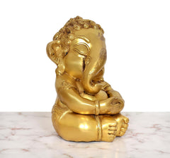 Brass Bal Ganesha murti, seated side angle, clasped legs and bangled hands