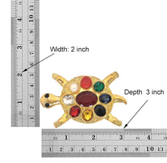 Metal tortoise figurine with size markings: 2 in wide, 3 in deep, gem-studded shell.