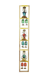 Gold-framed iron wall hanging with four musician dolls in teal, red, and green