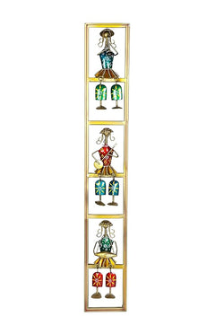 Gold-framed iron wall hanging with four musician dolls in teal, red, and green