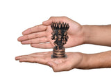 Hand-held scale photo of Lakshmi Varaha copper statue with multi-hood cobra canopy