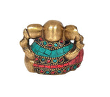 Brass Ganesha idol from rear, gold body with turquoise and red beaded ornament bands