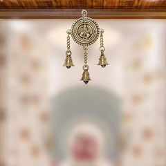 Brass Lakshmi hanging decor with ornate round medallion and three bells