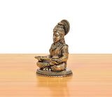 Bronze Maa Annapurna Devi figurine, side view, seated with hands in prayer on base