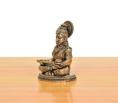 Bronze Maa Annapurna Devi figurine, side view, seated with hands in prayer on base