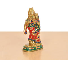 Radha-Krishna brass idol rear/side view, red outfit with gold detailing, multicolor beads