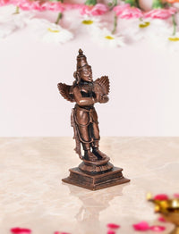 Copper standing Garuda idol statue side angle, ornate wings and carved pedestal base