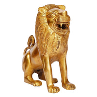 Brass lion idol statue close-up, roaring face with textured mane detail