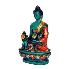 Sitzender Medizinbuddha in Resin, türkisgrüner Körper, mehrfarbig bemaltes Gewand, rundes Podest