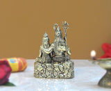 Brass Shiva & Parvati sitting idol, trident staff and crown details