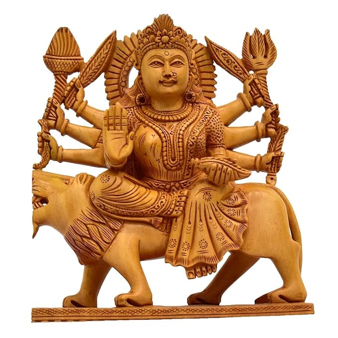 Handcarved wooden Durga figurine on lion, four arms, ornate crown, decorative showpiece