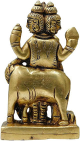 Dattatreya brass idol rear view, seated form with small animal figures on base