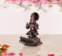 Copper Surya Dev Rath deity statue, side view, raised hand, ornate seven-horse base