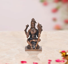 Copper goddess statue seated, raised hands, detailed crown, 2 inch height