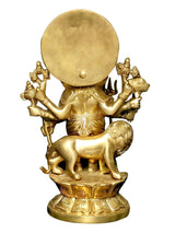 Brass Ganesha idol back view, eight arms holding symbolic items, seated on base