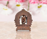 Copper back view of Ram Darbar idol with arched halo over figures