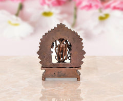 Copper back view of Ram Darbar idol with arched halo over figures