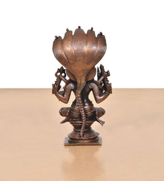 Back view of copper goddess idol statue, large cobra hood fan, seated base, 5 inch