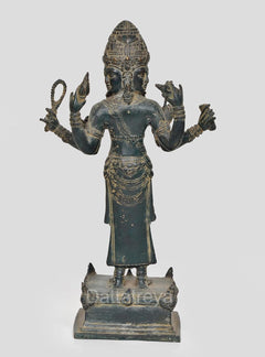 Back view four-armed Vishnu statue with coiled arm details, standing on base
