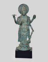 Bronze Vishnu statue on base, detailed draped garment, round halo, raised right hand