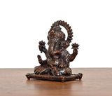 Sitting Lord Ganesha brass idol, side angle, raised arms and beaded base