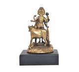 Gold-tone panchaloha deity idol on black base, view with mounted animal