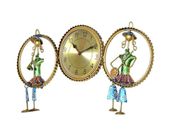 Iron wall clock musician decor: gold clock face with two green figures, blue and rainbow skirts