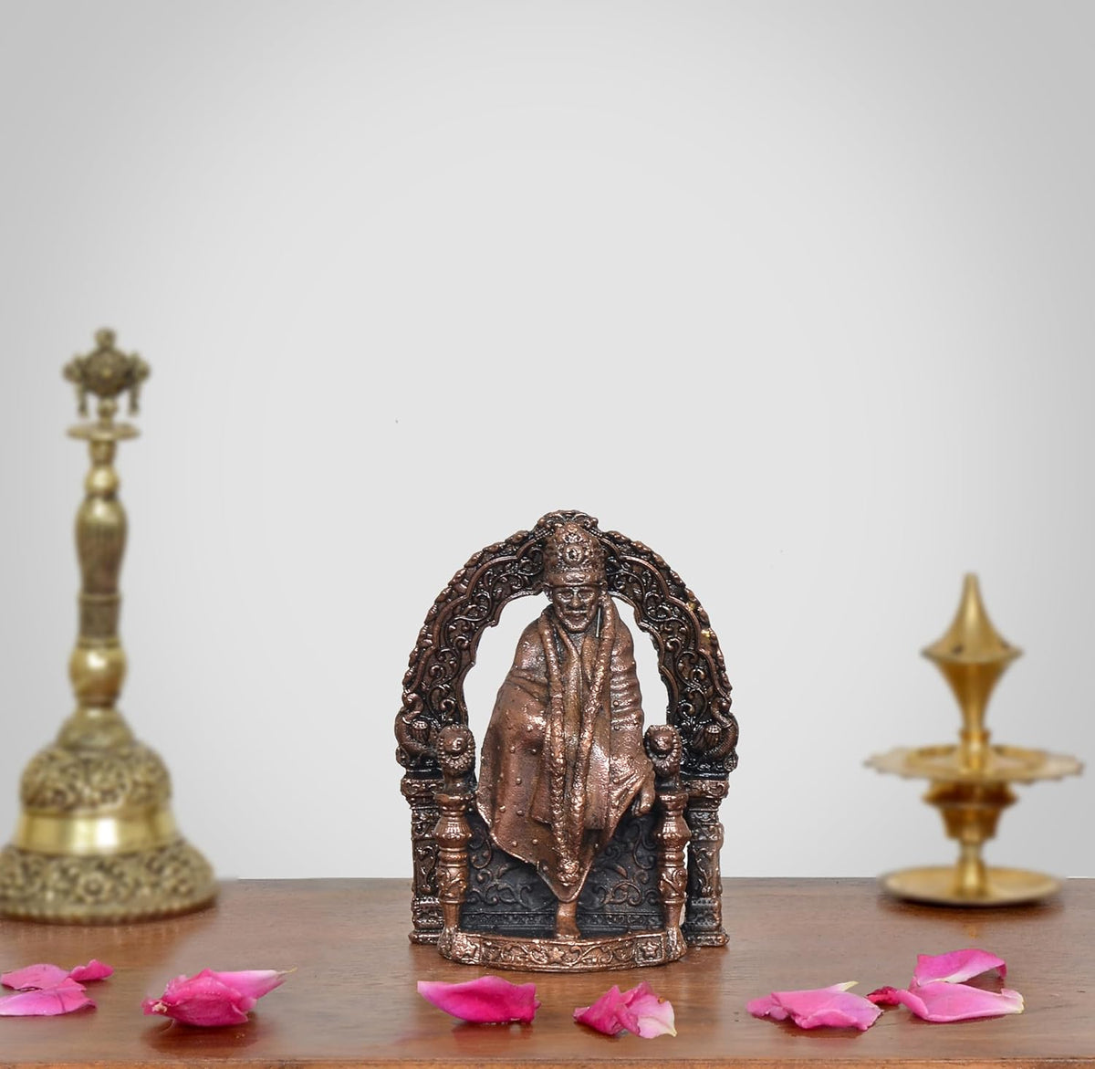 3 inch Copper Shirdi Sai Baba idol with ornate arch frame and folded hands