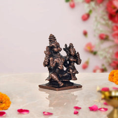 Copper Lakshmi Narasimha idol, side view with raised hands and ornate armor, 2 inch