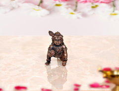 Bal Gopal Krishna idol statue, copper-toned kneeling pose with detailed headgear, 2 inch