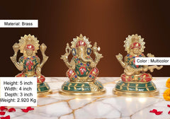 Brass idols, multicolor painted bodies and halos, seated poses with folded legs.