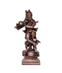 Standing dark bronze Krishna statue with raised arms and flute, on square base