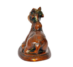 Brass Nandi bull statue, rear view with carved ornaments and raised tail
