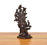 Brass Dakshinamurti Shiva murti angled view, sculpted hands and crown details