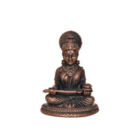 AONA Annapurna copper idol, front view of seated goddess with detailed jewelry and crown