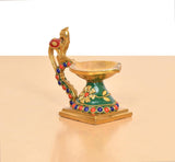 Brass peacock diya side view, multicolor enamel and beaded border