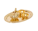 Ornate round plate with gold matki and two small bowls, 6-inch width