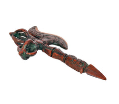 Multicolor brass parashu phurba dagger, side view of carved handle and pointed tip