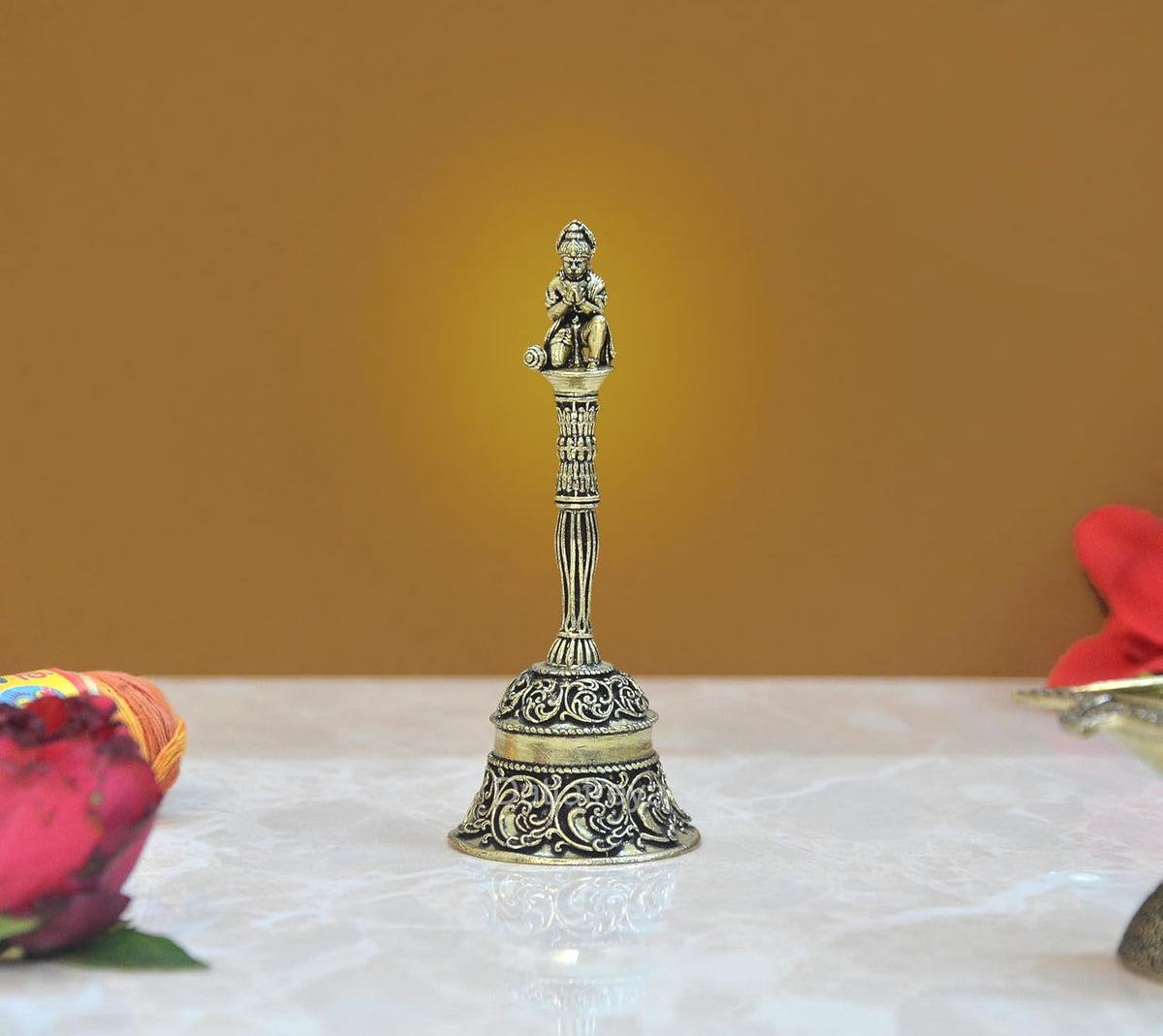 Superfine brass pooja bell with Hanuman figurine on top, ornate base