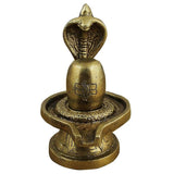 Lord Shiva Lingam sculpture, front view gold-tone linga with lotus base