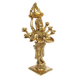 Gold brass figurine in profile with eight diya bowls, ornate long robe and square base