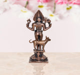 Shree Kal Bhairav idol, copper tone rear view with crown and circular medallion on chest