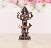 Shree Kal Bhairav idol, copper tone rear view with crown and circular medallion on chest