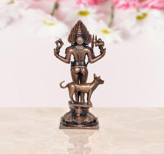 Shree Kal Bhairav idol, copper tone rear view with crown and circular medallion on chest