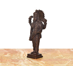 Brown brass Dhanvantri statue (6 inches), side view with raised arms and detailed robe